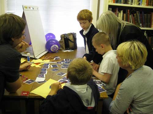 The fourth group starting their storyboard with the teachers.